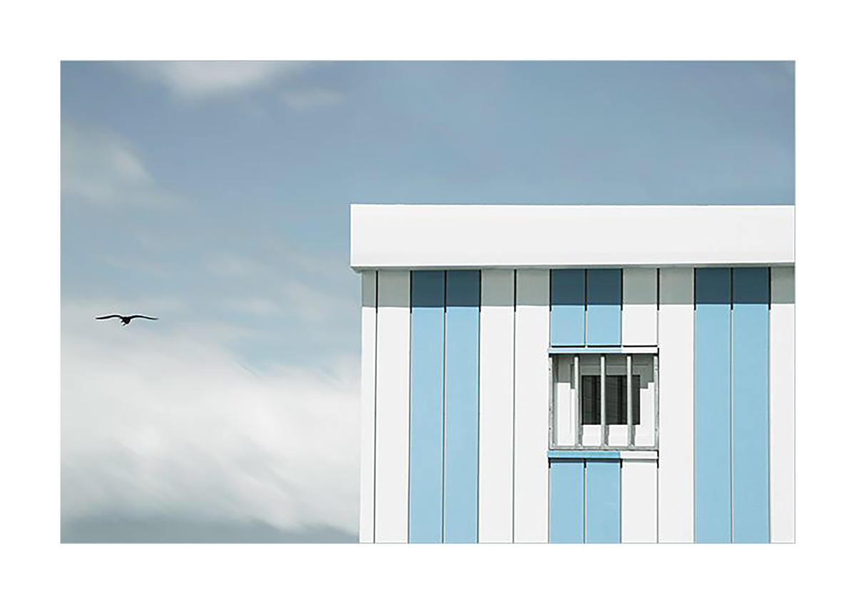 Flight Over Blue Building  | Gilbert Claes